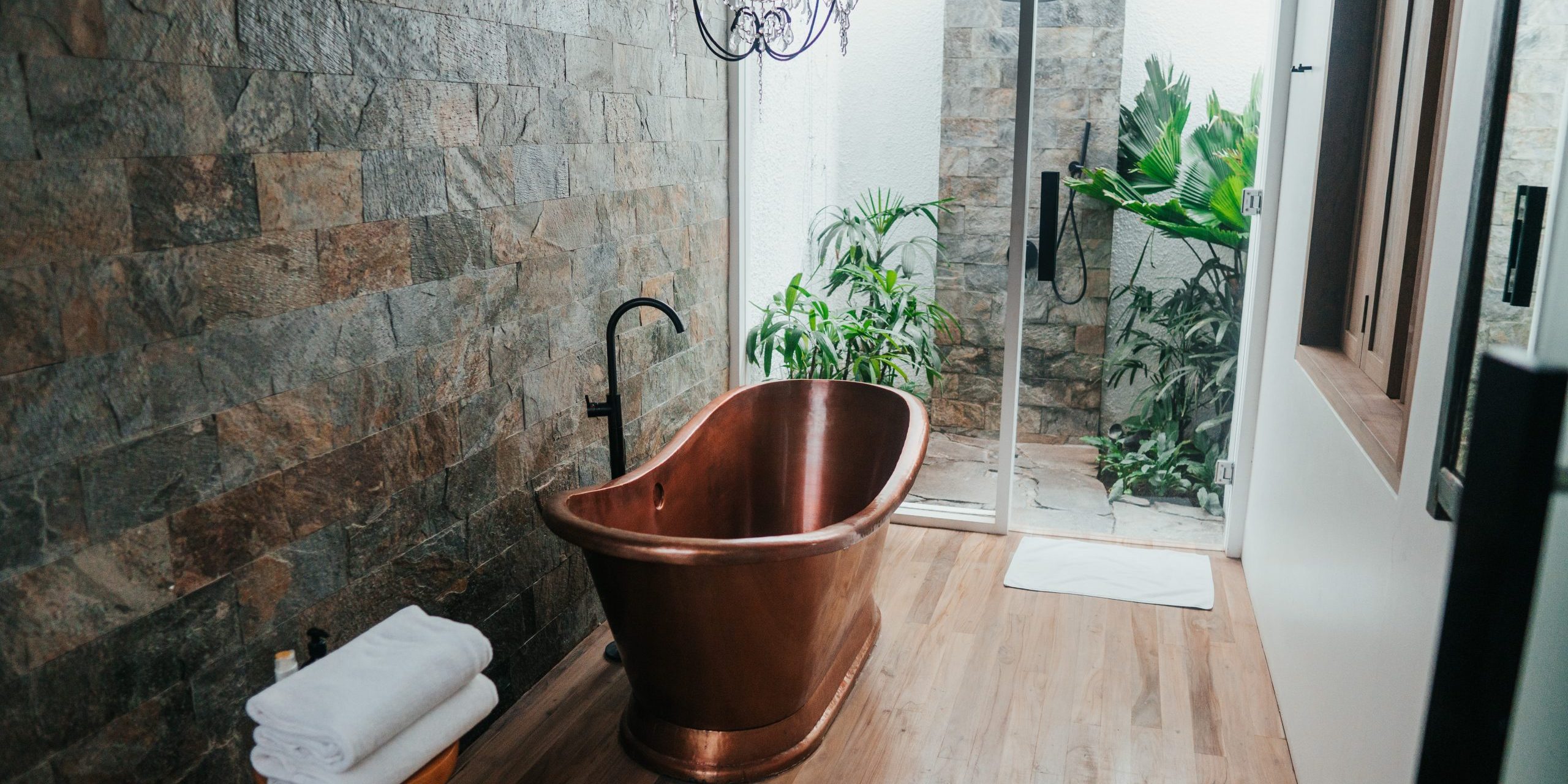 bathroom with free-standing bath tub trending in 2021