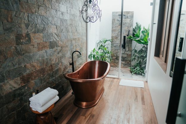 bathroom with free-standing bath tub trending in 2021